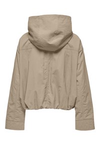 Veste courte beige en tissu léger. Dotée d'une capuche et d'une coupe ample avec une subtile texture et des manches larges.