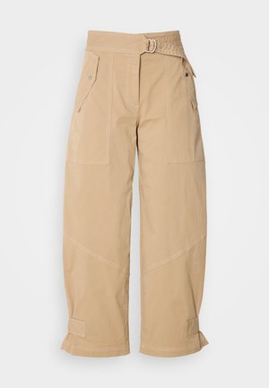 Beige vidde bukser laget av slitesterkt stoff, med to frontlommer, belted midje og brettede mansjetter med søm-detaljer.
