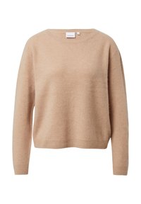 Beżowy sweter wykonany z miękkiego materiału, z okrągłym dekoltem i długimi rękawami. Prosty, luźny fason ze lekko skróconym krojem.