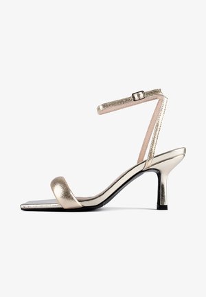 HYPNOTIC - Aukštakulniai sandalai - gold