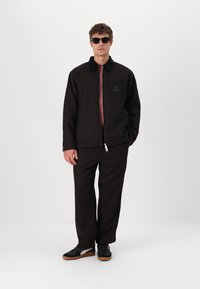 Carhartt WIP TRUMAN COAT - Light jacket - chocolate/black