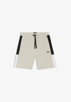 Pantaloncini beige con coulisse, pannelli laterali neri e bianchi e logo "BOSS" sulla gamba destra, disposti in piano su sfondo bianco.