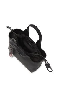 Black leather handbag with a textured exterior, drawstring closure, and fabric-lined interior. Features a charm with tags attached.