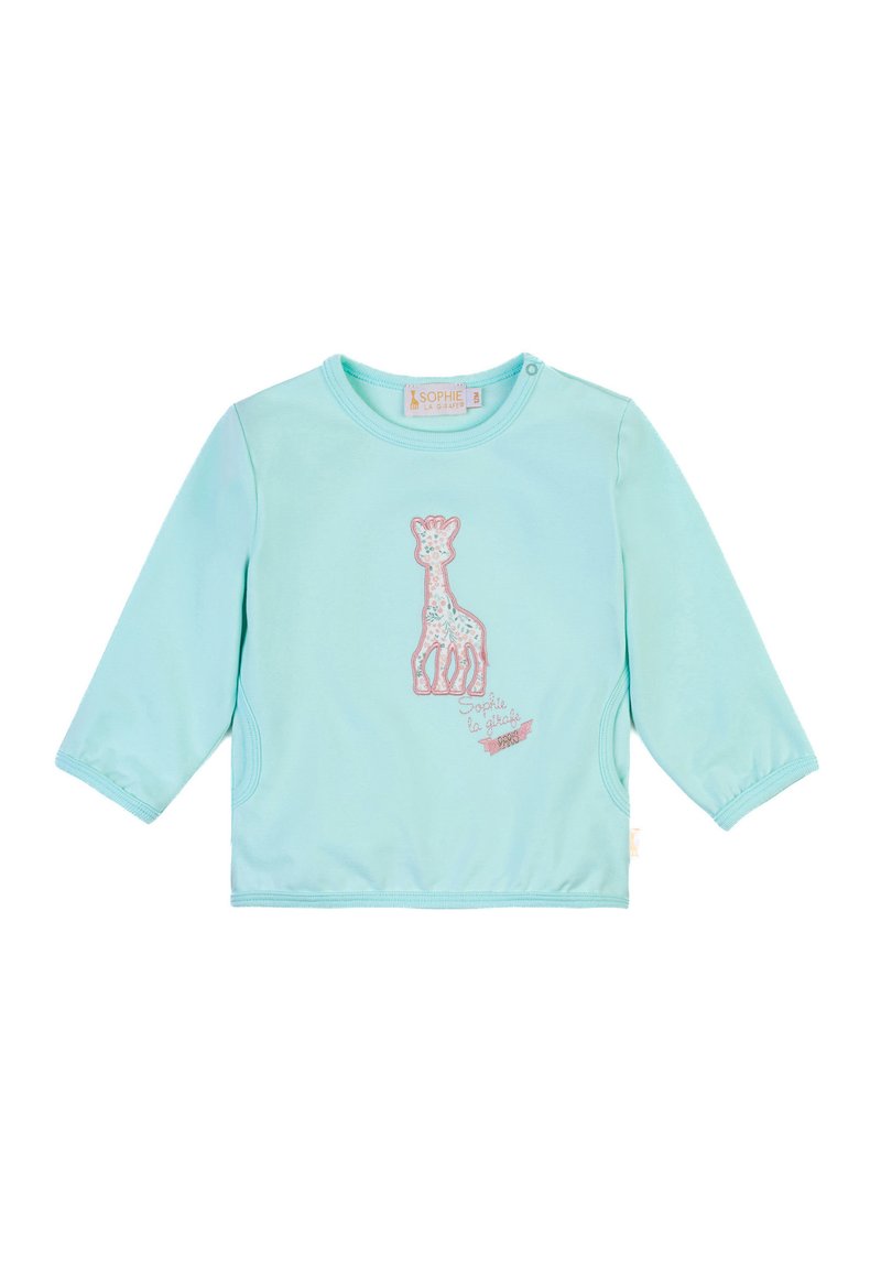 Camicia a maniche lunghe blu chiaro con design di giraffa, tessuto morbido, collo rotondo e dettagli con tasca laterale. Presenta accenti ricamati.