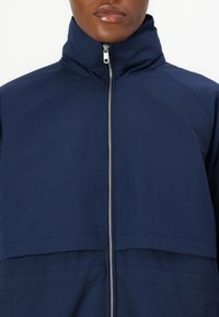 Tommy Hilfiger LONG WAISTED WINDBREAKER - Parka - night sky