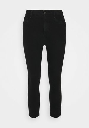 Jeans skinny de mezclilla negra con cintura alta, con cierre de botón, cinco bolsillos y una textura suave. El diseño se ajusta al cuerpo en todo momento.