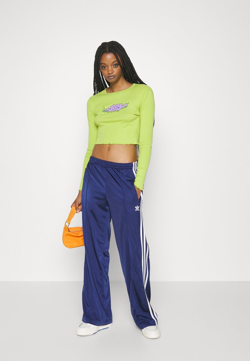 navy blue adidas joggers womens