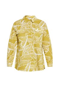 Camicia a maniche lunghe in tessuto giallo con stampa di foglie bianche, dotata di una chiusura con bottoni e due tasche sul petto per un ulteriore dettaglio.