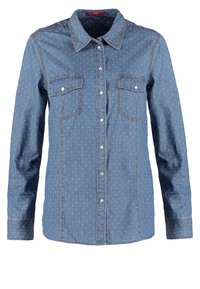 Camicia a maniche lunghe in denim blu con motivo a pois bianchi, bottoni a pressione sul davanti e due tasche sul petto con pattina e chiusura a pressione.