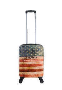 Hard-shell suitcase featuring an American flag design, with textured surface, black wheels, and a telescopic handle for easy maneuverability.