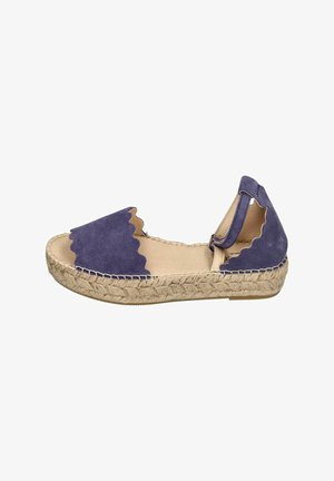 Purple suede espadrille with scalloped design, natural jute sole, and an open back. Features a textile upper and a flat woven base.