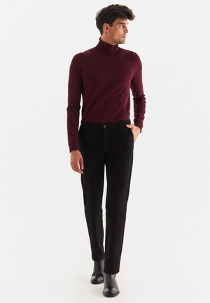 Spodnie materiałowe