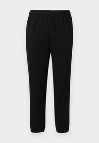 Pantalones de chándal negros y casuales con cintura elástica y puños en los tobillos, exhibidos sobre un fondo blanco liso.