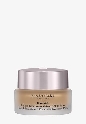 Pot de crème de maquillage Elizabeth Arden Ceramide Lift and Firm avec SPF 15, contenant en verre givré et couvercle métallique rose doré.