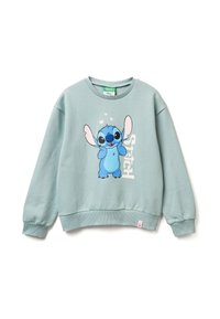 Světle modrá mikina vyrobená z bavlny, se znakem kreslené postavičky s velkými ušima a srdíčky, vedle slova "Stitch" vytištěného na bílo.