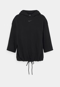 Svart oversized hoodie med dragsko i nederkant, trekvartslånga ärmar och en liten grå Nike-logotyp på bröstet, med en mjuk tygstruktur.