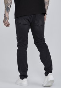 SIKSILK DISTRESSED - Straight leg jeans - washed black