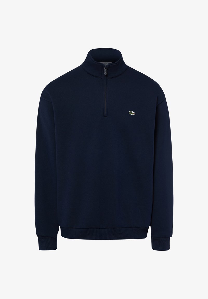 Felpa blu navy a maniche lunghe con una corta cerniera frontale e un piccolo logo verde coccodrillo sul petto sinistro.