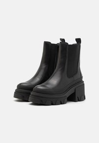 ALDO Wide Fit Kotníkové boty na platformě - black