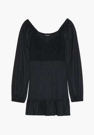 Czarna bluzka z kwadratowym dekoltem i bufiastymi rękawami. Wykonana z teksturowanej tkaniny, z rozszerzanym dołem. Prosty krój bez wzorów i akcentów.