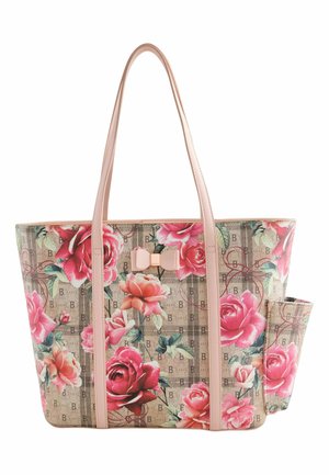 Beige draagtas met roze handvatten met een bloemenpatroon van grote roze en rode rozen en een klein roze strikdetail.