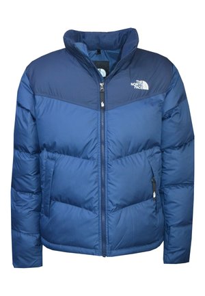 Giubbotto imbottito azul navy con colletto alto, zip frontale e due tasche laterali; presenta una texture a quadri e il logo sul petto.