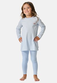 Light blue striped long-sleeve top with a round neckline and small embroidered design, paired with matching light blue leggings.