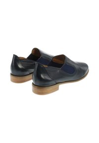 Chaussures en cuir noir avec un talon bas, des panneaux latéraux élastiques et une surface lisse. Présentent un bout arrondi et un design simple et élégant.