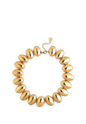 Goudkleurige ketting met grote, gladde ovale kralen die aan elkaar zijn verbonden, met een verstelbare ketting en sluiting op een witte achtergrond.