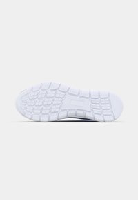 White sneaker sole with a textured rubber pattern, featuring rectangular and hexagonal ridges for grip and stability. Smooth edge finish.