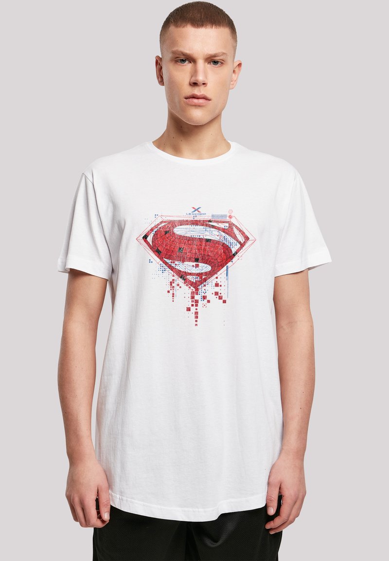 White cotton t-shirt featuring a red Superman logo graphic with pixelated details. Short sleeves and a round neckline.