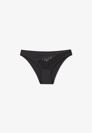 Culotte de bikini noire, avec un panneau de dentelle délicate sur un côté, tissu lisse, taille basse et design sans coutures.