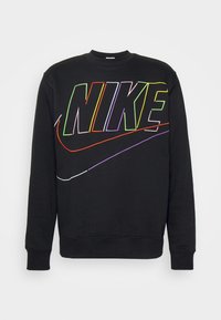 Svart sweatshirt med flerfärgad broderad "NIKE"-logotyp och swoosh-design. Rundad halslinning och ribbade muddar ger en mjuk känsla.