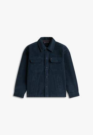 Chaqueta de pana azul marino con cierre de botones, dos bolsillos en el pecho, bolsillos laterales y un cuello puntiagudo. Tejido texturizado y diseño de corte relajado.