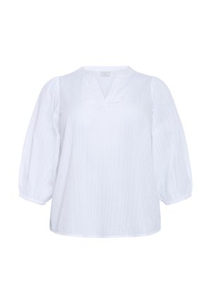 Blusa bianca con scollatura a V, righe verticali e maniche corte a palloncino. Realizzata in tessuto leggero con una consistenza liscia.