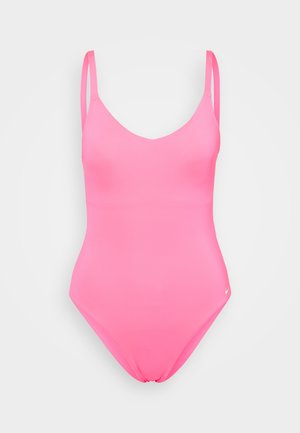 Rosa heldrakt med tynne stroppar og V-halsdesign. Glatt stoff og en liten Nike-logo på nederste høyre side.