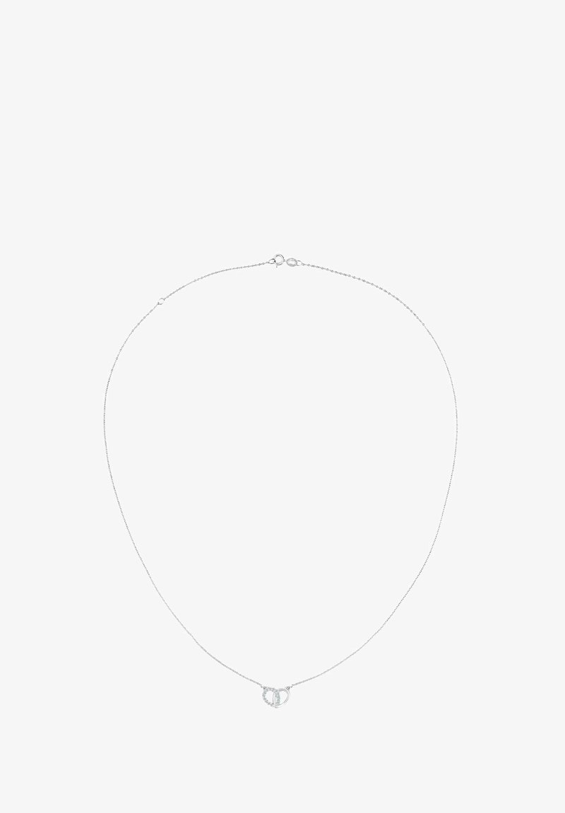 Sidabro pakabukas su plona grandinėle ir apvaliu pendantu, kuriame yra susipynę kilpos. Dizainas minimalistiškas ir glotnus.