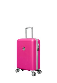 Hard-shell pink suitcase with hexagonal texture, silver zipper and hardware, extendable handle, and four multi-directional wheels.