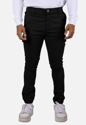 ELÁSTICA CON PUÑO - Pantalones cargo - black