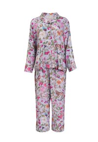 Pyjamahose aus leicht lila Stoff mit floralen und tierischen Mustern. Mit einem kragenlosen Oberteil und passenden Hosen mit Bündchen am Saum.