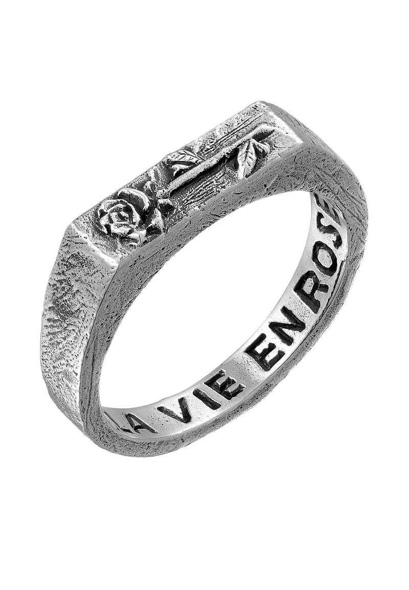 Sterling silver ring with a flat design, featuring a raised rose motif on one side and engraved text "LA VIE EN ROSE" on the interior surface.