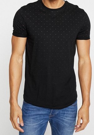 Černé krátké tričko s jemným tečkovaným vzorem, vyrobené z měkké tkaniny, s kulatým výstřihem a slim fit střih.