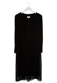 Czarna sukienka z długim rękawem, z plisowanym korpusem, zapinana na guziki z przezroczystym do�łem, wisząca na białym haczyku.