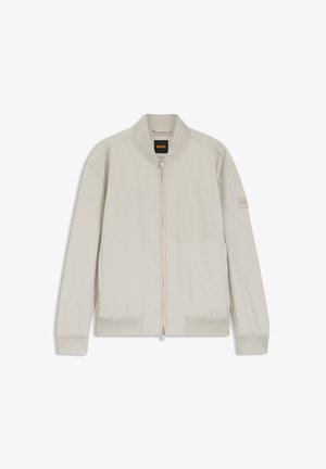 Licht beige bomberjack met ritssluiting, geribde kraag, manchetten en zoom, met BOSS-label aan de binnenkant en op de linkermouw.