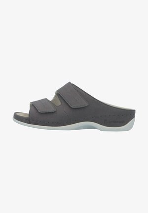 Gray slip-on sandal featuring two adjustable Velcro straps, a cut-out design, and a textured surface on a white sole.