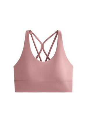 Světle růžová sportovní podprsenka s hladkou texturou, širokými ramínky a zdvojeným křížovým zadním designem. Švy poblíž lemu pro lepší strukturu.