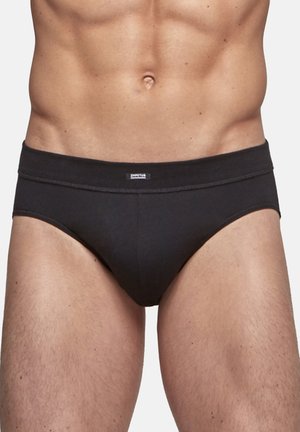 Black men's brief underwear, made of smooth cotton with a logo on the waistband and a fitted design that contours to the body.