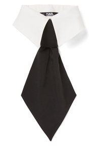 Corbata en blanco y negro con un extremo puntiagudo. La tela negra tiene una textura suave, mientras que el cuello blanco presenta bordes afilados y angulares.