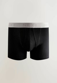 Fekete boxer alsónadrág, puha anyagból, szürke gumiövvel, amelyen a "NEXT" logó látható. A dizájn elülső zsebet és varrott szegélyeket tartalmaz.