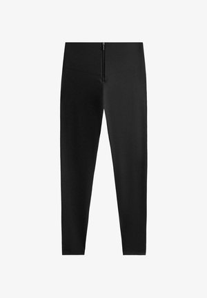 Leggings neri a vita alta realizzati in un tessuto elasticizzato con una texture morbida e un dettaglio con zip sul davanti della vita.